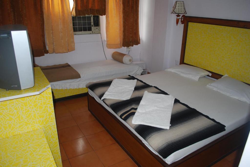 Charans Guest House Lakhnau Szoba fotó