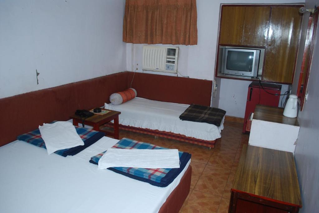 Charans Guest House Lakhnau Szoba fotó